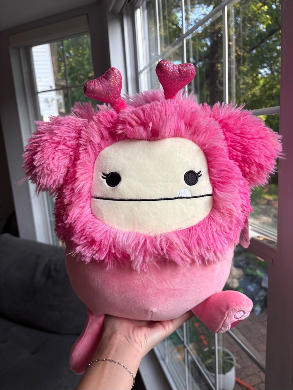 Caprienne the pink Bigfoot squishmallow with a heart headband NWT valentines